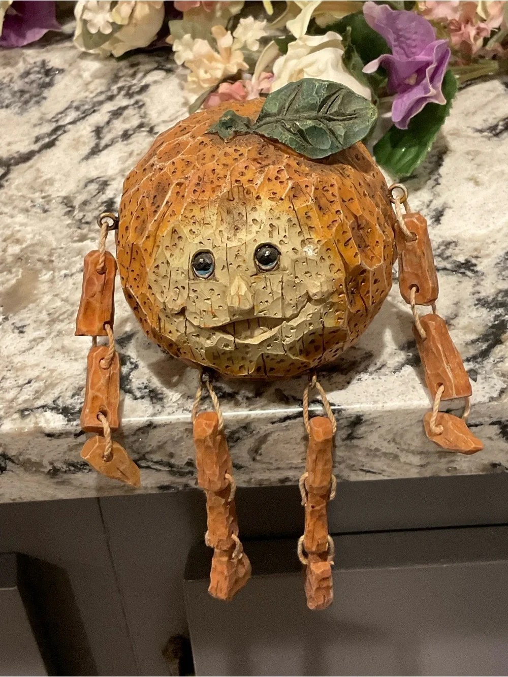 BR-Orange FRUIT SHELF SITTER W/DANGLY LEGS AND ARMS with Green Leaf Accent